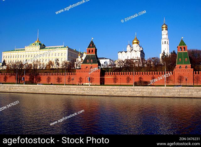 Blue river and red moscow kremlin wall, Russia