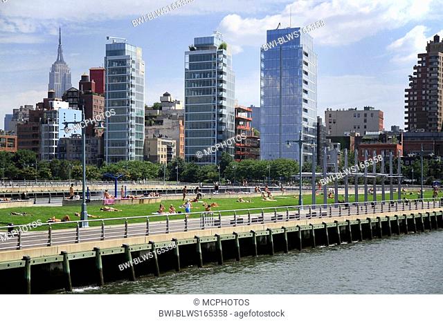 Sunbathers on the west side Piers, USA, New York City, Manhattan