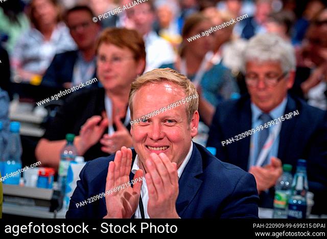 09 September 2022, Lower Saxony, Hanover: Tilman Kuban, chairman of the Junge Union applauds at the CDU federal party conference
