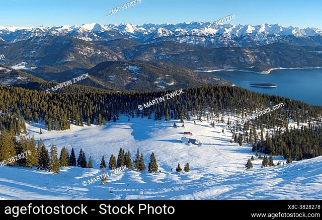 View towards lake Walchensee and the Karwendel mountain range. View from Mt. Jochberg near lake Walchensee during winter in the bavarian Alps