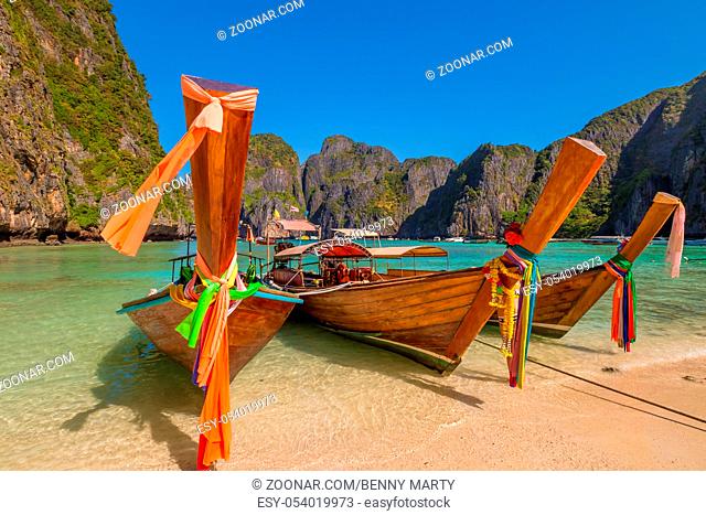 Long Tail Boat, traditional wooden boats, at Maya Bay lagoon of famous movie The Beach with Leonardo DiCaprio, Phi Phi Leh, Andaman Sea in Thailand