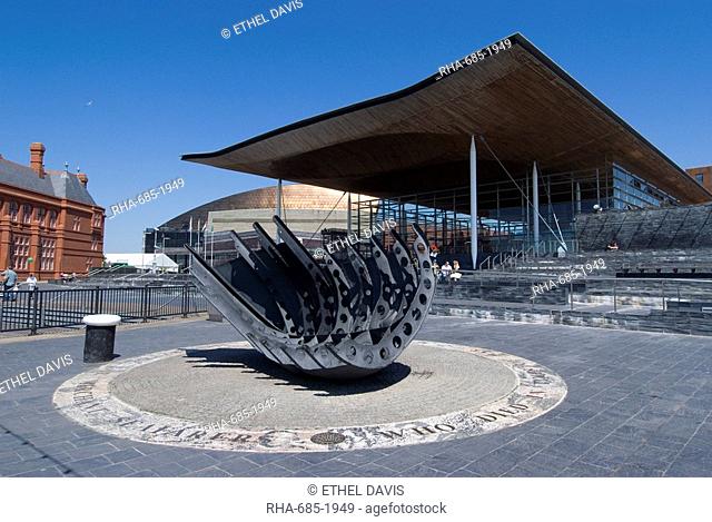 Seafarers War Memorial on the hull of a beached ship in front of the Senedd Senate building, Cardiff Bay, Cardiff, Wales, United Kingdom, Europe