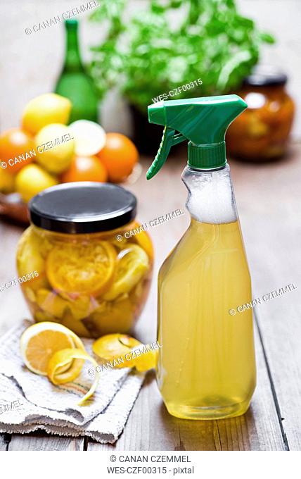 Homemade cleansing agent, vinegar, peels of citrus fruits, ginger and water