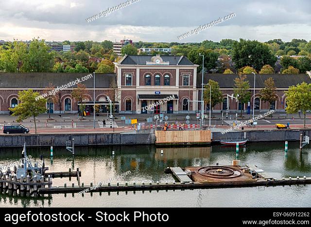 Middelburg, The Netherlands - October 02, 2019: Middelburg railway station with construction site for new canal bridge in front of it