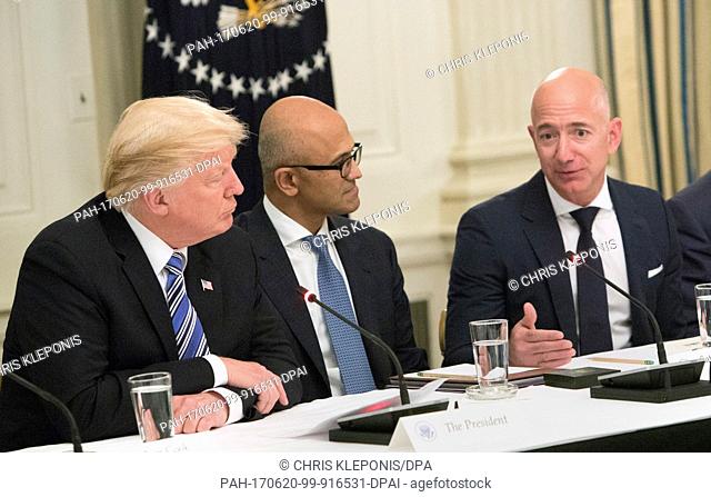 United States President Donald J. Trump (L-R) participates in an American Technology Council roundtable with corporate and eduction leaders including Microsoft...