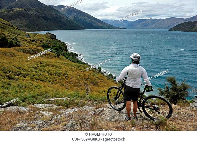 Female mountain biker, New Zealand