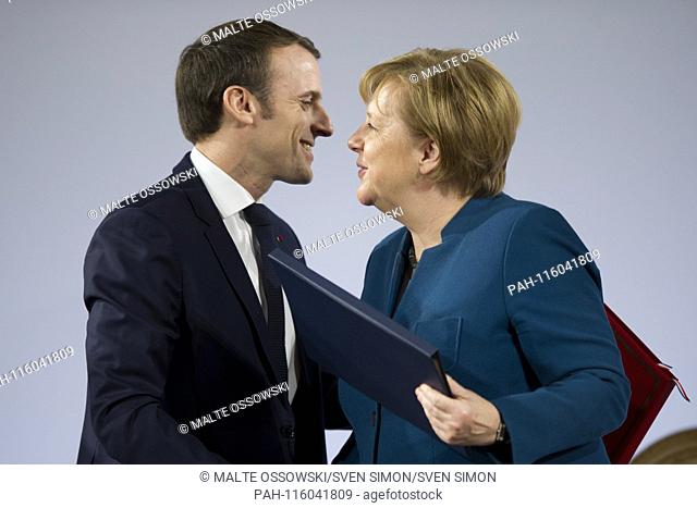Emmanuel MACRON, President of the French Republic, and with Chancellor Angela MERKEL, sign the contract, signing the Treaty between the Federal Republic of...
