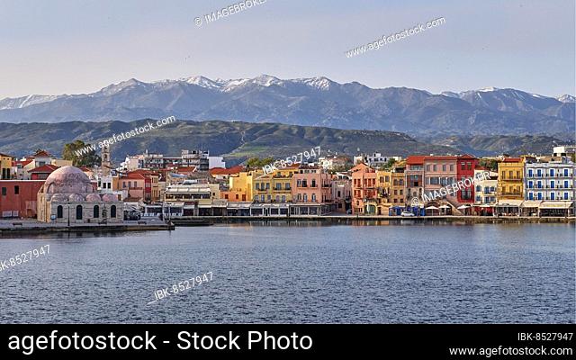 Lefka Ori, White Mountains, Snowy Mountains, Venetian Old Town, Venetian Harbour, Row of Houses, Colourful Houses, Calm Sea, Grey Blue Sea, Blue Cloudless Sky