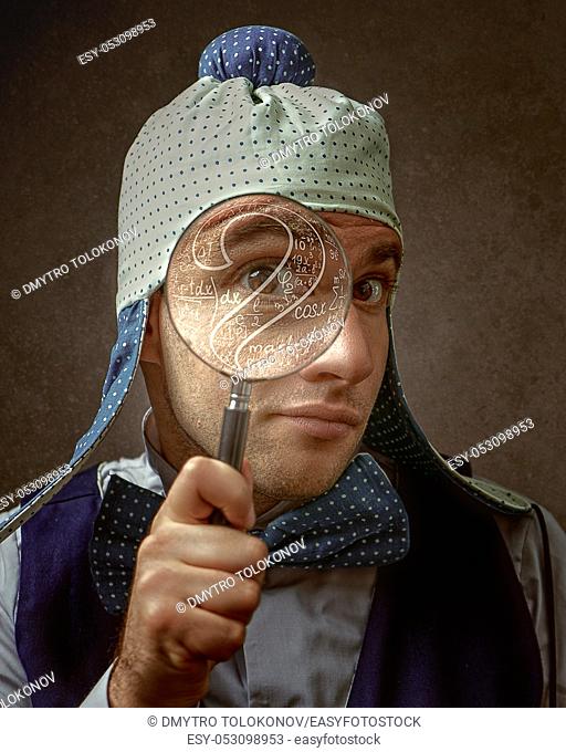 Nerd, Funny male portrait with magnifier loupe