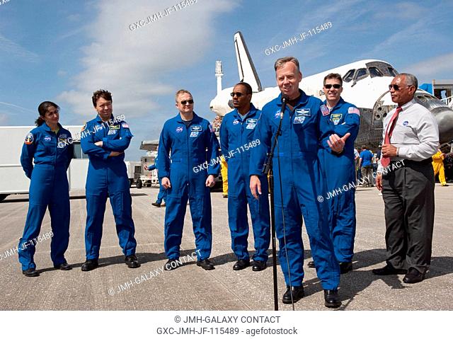 On the Shuttle Landing Facility at NASA's Kennedy Space Center in Florida, astronaut Steve Lindsey, STS-133 commander, talks to media representatives about...