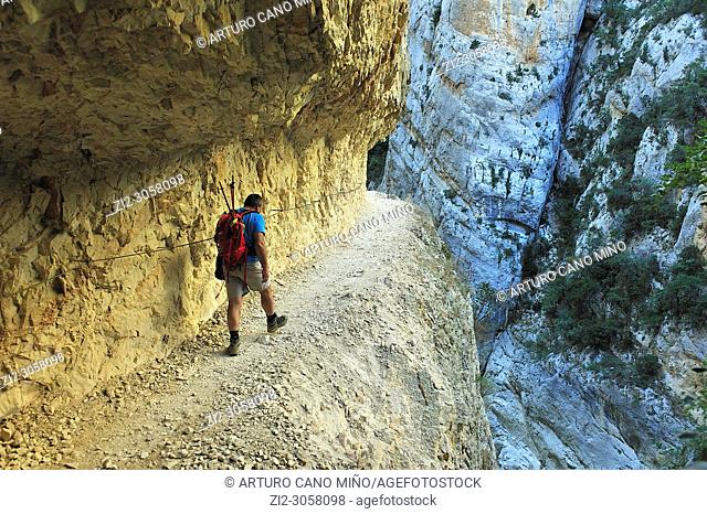 A hiker on the Congost (gorge) of Montrebei. Lerida province, Spain
