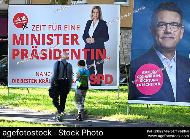 PRODUCTION - 26 September 2023, Hesse, Frankfurt/Main: Election posters of top candidates Boris Rhein (CDU, r), Minister President of Hesse