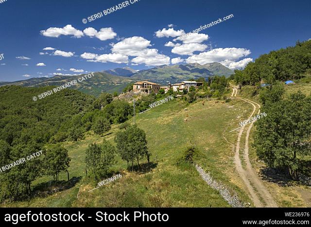 Aerial view of the village of Mentui and the mountain surroundings of the Vall Fosca valley (Lleida, Catalonia, Spain, Pyrenees)