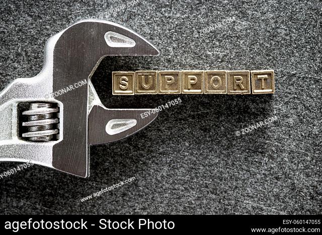support word made from metallic blocks with adjustable wrench