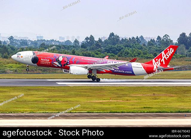 An AirAsia X Airbus A330-300 aircraft with registration number 9M-XXJ in Sony Noise Cancelling special livery at Chengdu Airport, China, Asia