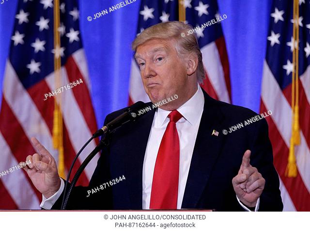 United States President-elect Donald Trump points his fingers when he speaks at a press conference at Trump Tower on January 11, 2017 in New York City