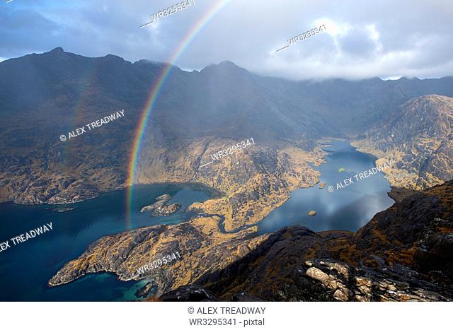 A rainbow above Loch Coruisk and the main Cuillin ridge seen from the top of Sgurr Na Stri on the Isle of Skye, Inner Hebrides, Scotland, United Kingdom, Europe