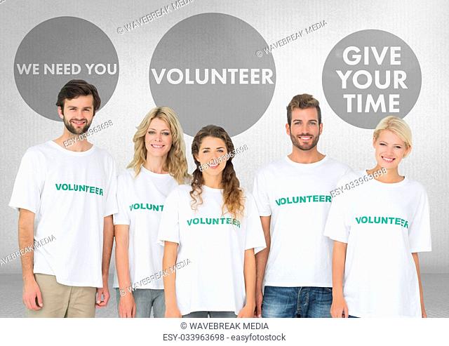 Group of volunteers standing in front of Volunteer graphics