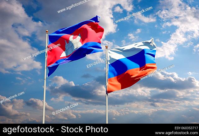 Beautiful national state flags of Russia and Cambodia together at the sky background. 3D artwork concept