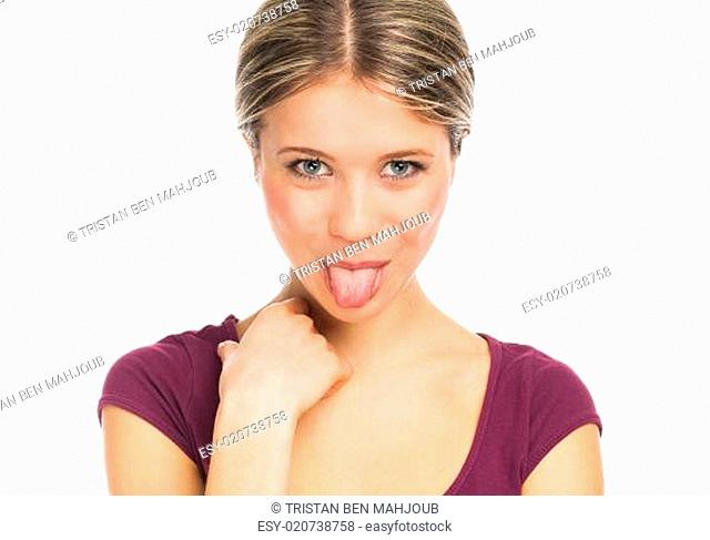 Cute woman pokes out her tongue