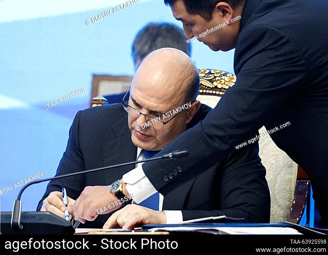 KYRGYZSTAN, BISHKEK - OCTOBER 26, 2023: Russia's Prime Minister Mikhail Mishustin (seated) attends the 22nd session of the Council of Heads of Government (Prime...