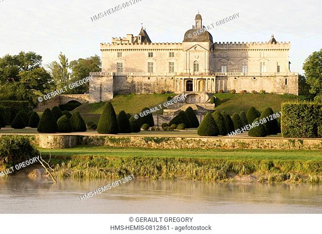 France, Gironde, Vayres, garden and castle of Vayres in the sunrise of the sun and the morning mists on the river Dordogne