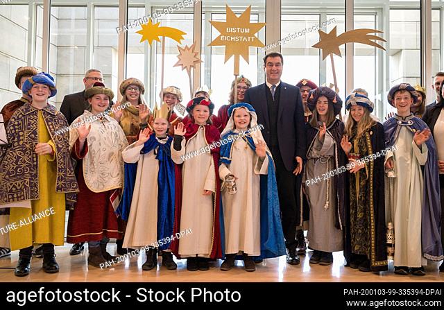 03 January 2020, Bavaria, Munich: Carol singers from the diocese of Eichstätt visit Markus Söder (CSU), Minister President of Bavaria