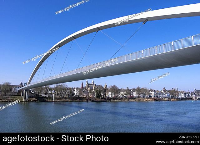 Maastricht, The Netherlands: modern footbridge over the river Maas