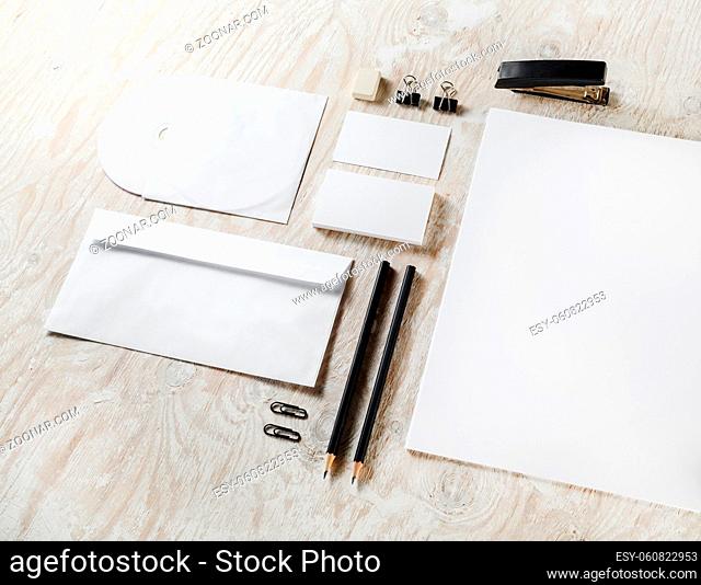 Blank template for branding identity. Blank stationery set and on wooden table background. Responsive design template