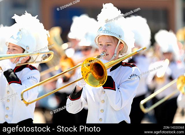 Benton Harbor, Michigan, USA - May 4, 2019: Blossomtime Festival Grand Floral Parade, Members of the Lakeshore Middle School Marching Band performing at the...