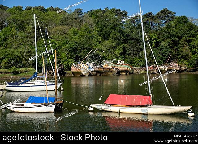Douarnenez, sailboats and shipwrecks in the historic port of Port-Rhu, France, Brittany, Finistère department