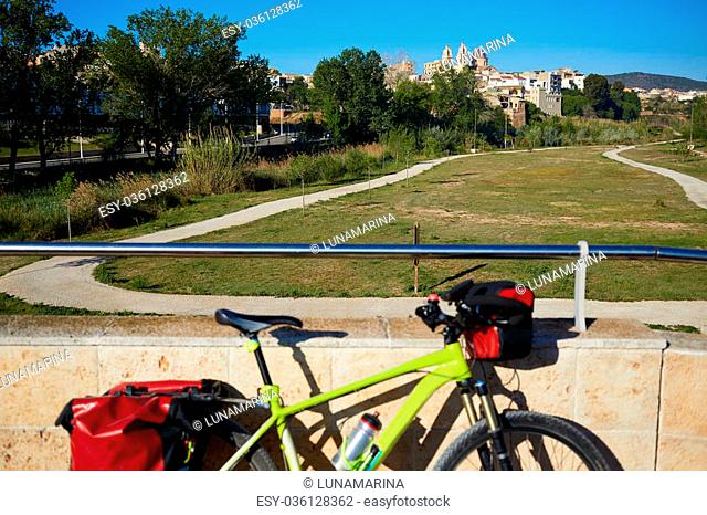 Ribarroja del turial village from old stone bridge with bicycle at valencia spain