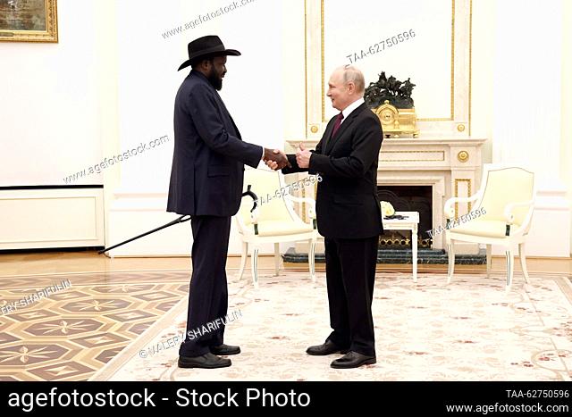 RUSSIA, MOSCOW - SEPTEMBER 28, 2023: South Sudan's President Salva Kiir Mayardit (L) and Russia's President Vladimir Putin shake hands during a meeting at the...