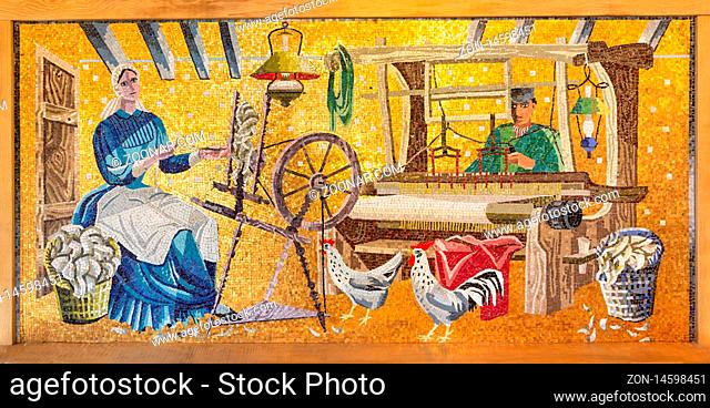 Ootmarsum, The Netherlands - August 18, 2019: Mosaic of old agricultural scene in outdoor museum Ootmarsum