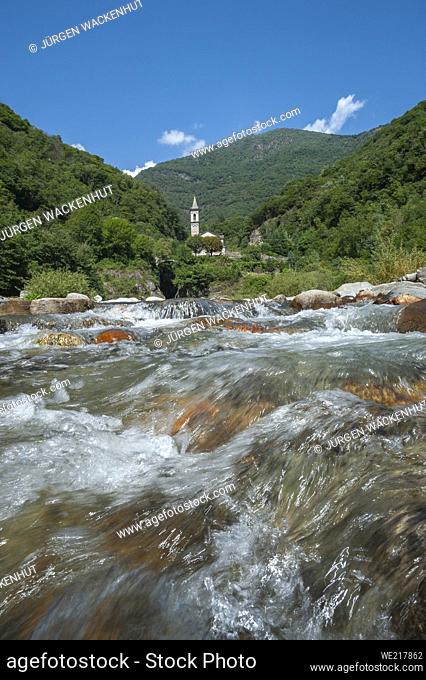 Cannobino river and Saint Anna church in the background, Cannobio, Piedmont, Italy, Europe | Cannobino river near Cannobio and Saint Anna church in the...