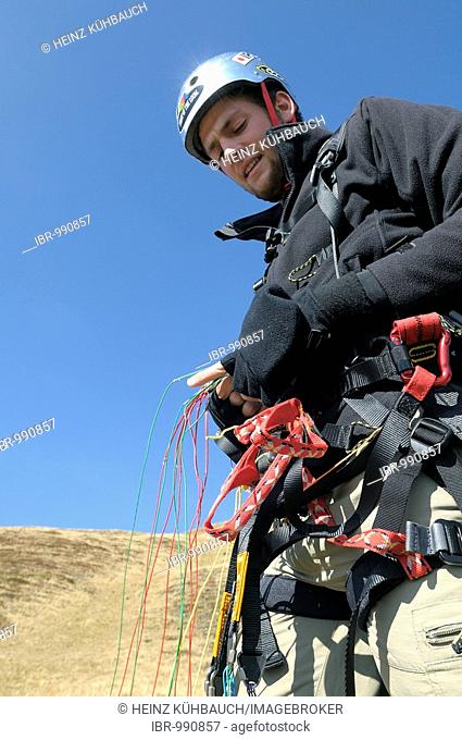 Paraglider preparing for takeoff, Monte Cavallo, Sterzing, Province of Bolzano-Bozen, Italy, Europe