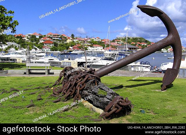 Rusty English anchor on display beside harbour Gustavia St Barts