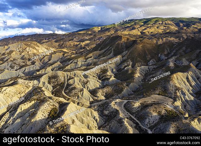 Bare ridges of eroded sandstone in the Tabernas Desert, Europe's only true desert. Aerial view. Drone shot. Almeria province, Andalusia, Spain