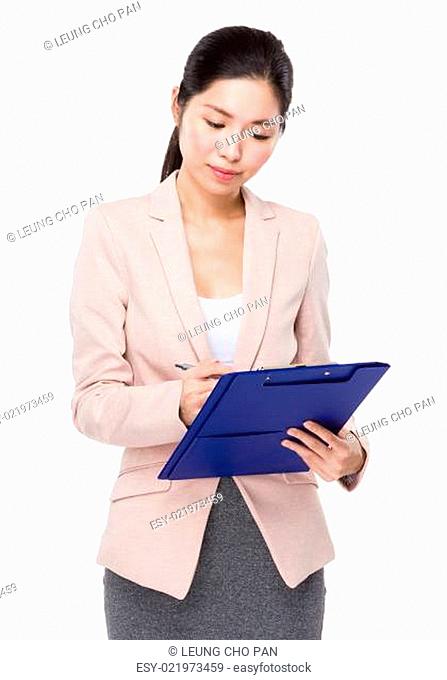 Business woman write on clipboard