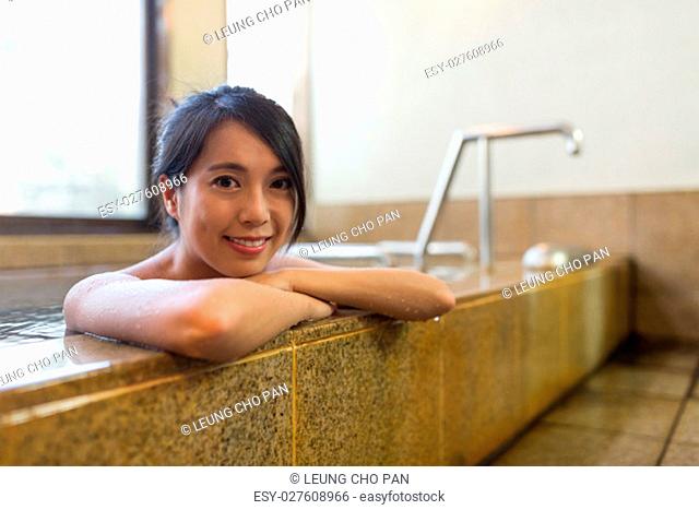 Young woman enjoy hot springs