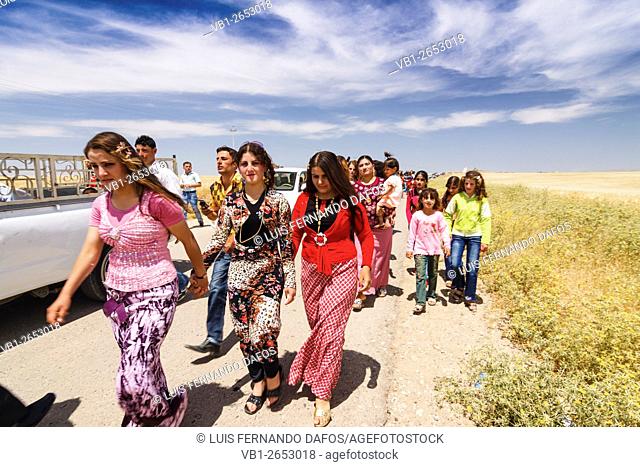 All decked out Yazidi crowd in its Wednesday best coming from a religious folk festival at Khank, Kurdistan region, Iraq
