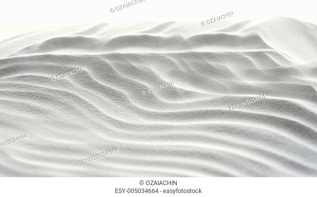 Abstract background of white sand ripples at the beach