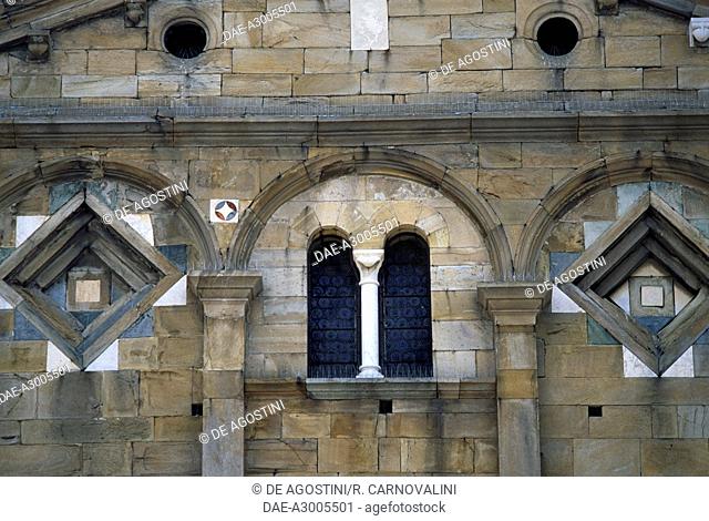 Two-mullioned window and multi-colour marble, facade of the Parish Church of San Giovanni and Santa Maria Assunta, Cascina (9th century), Tuscany, Italy
