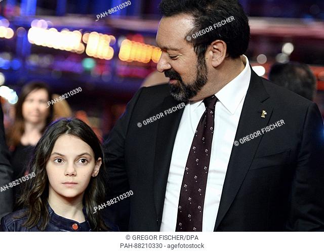 Director James Mangold (R) and actress Dafne Keen attend the premiere of ""Logan"" at the 67th Berlin International Film Festival in Berlin, Germany