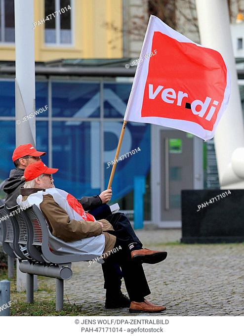 Members of the German service sector union Verdi gather for a warnig strike in Magdeburg, Germany, 17 March 2014. After the first round in the collective...