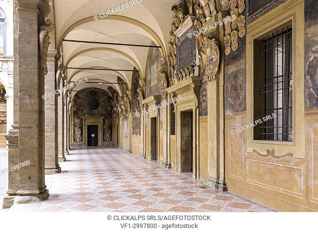 Portico on the internal courtyard of the Archiginnasio, Bologna university. Bologna, Emilia Romagna, Italy