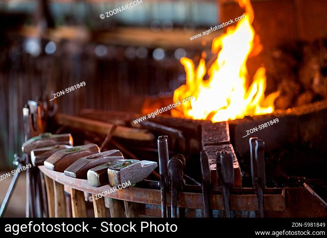 Working forge of the blacksmith in old shop