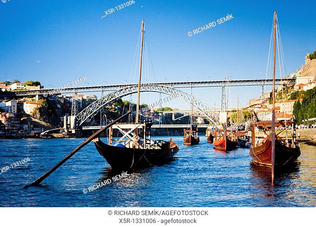 Dom Luis I Bridge and typical boats rabelos, Porto, Douro Province, Portugal