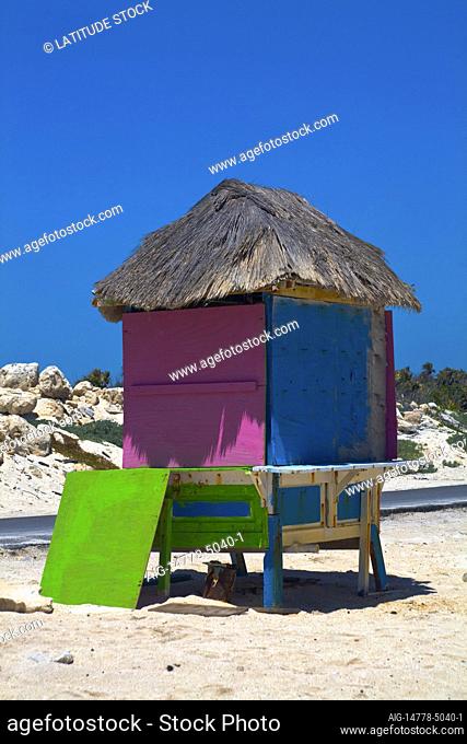 The coastline of Quintana Roo has large resorts such as Cozumel and there are small brightly painted beach huts selling food and drinks to the tourist