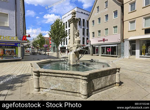 Tanners' and dyers' fountain in Wilhelmstraße by Professor Josef Zeitler, dyer with dyer's kettle, stone figure as a symbol of Reutlingen's trade